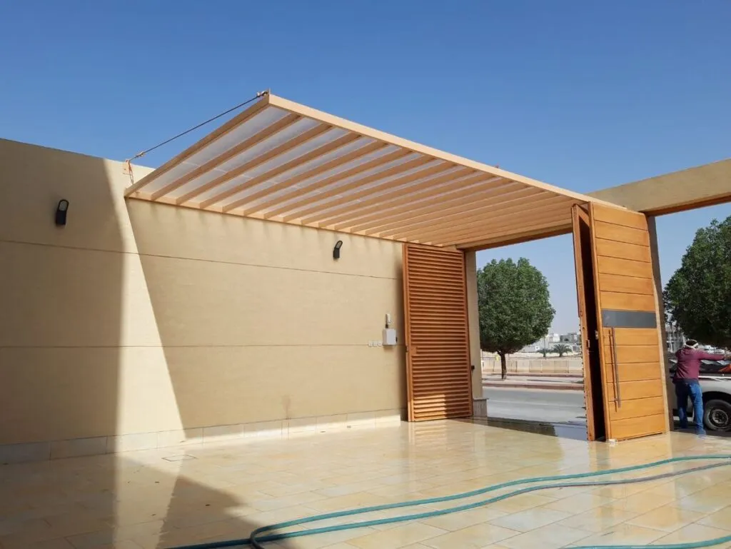 اصلاح مظلات كراج مقوسة بتثبيت آمن في الرياض 